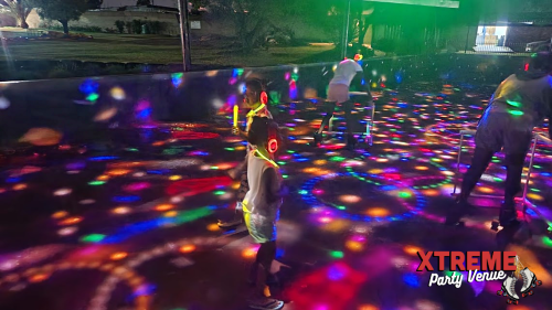 Silent disco with coloured lights and headphones
